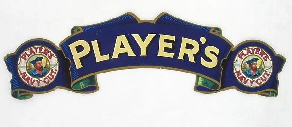 Players, 1923. Player's counter card in the shape of a banner with scrolled ends