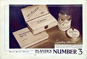 <b class=qtipBold><figcaption>No. 3 cigarettes, 1928</figcaption></b><br>Player's No. 3 rectangular metal counter card with a glossy finish. In the centre is a photograph two boxes of No. 3 Cigarettes.<br><em>© Produced by the kind permission of Imperial Tobacco Limited, England</em> No. 3 cigarettes, 1928